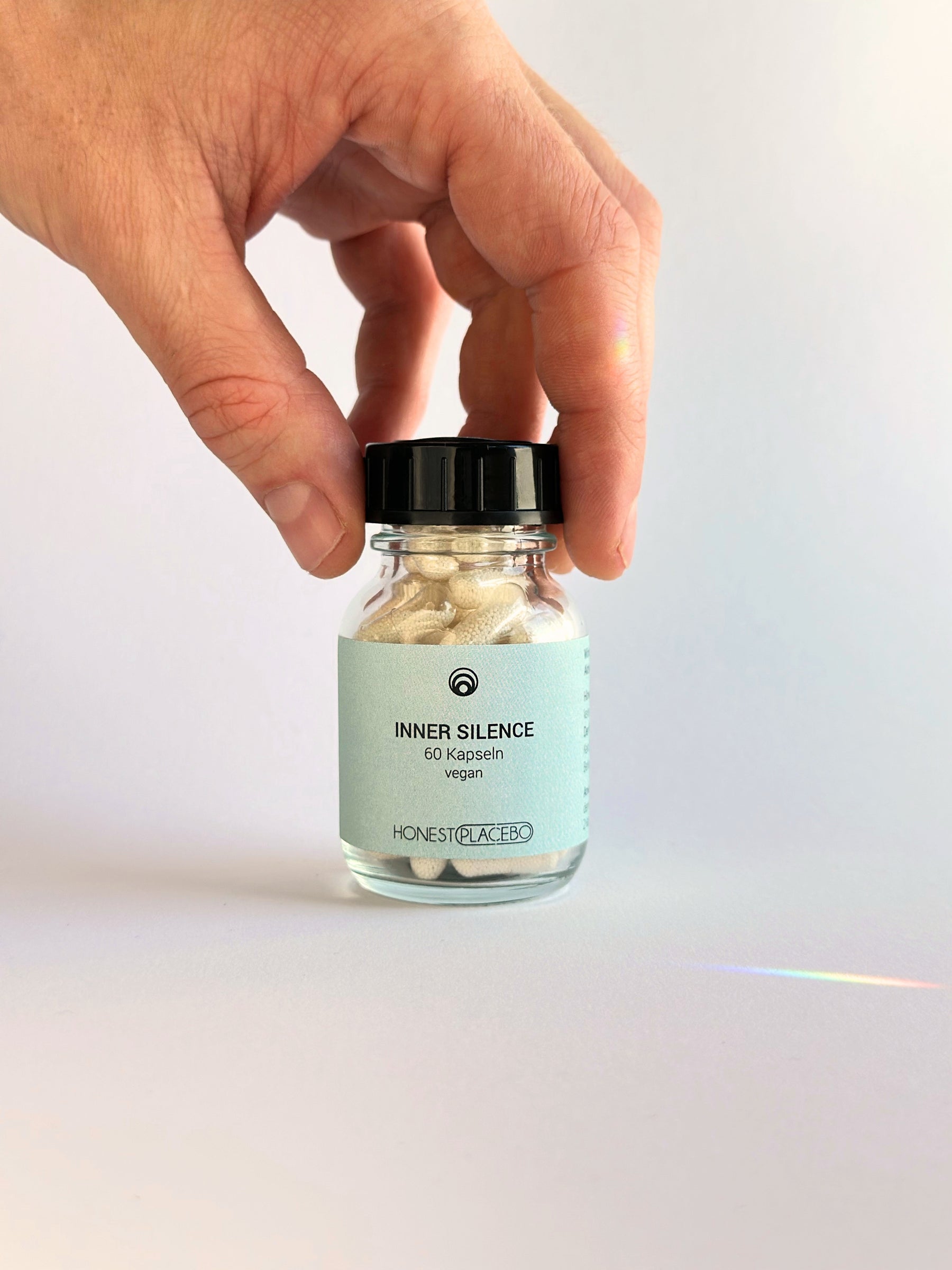 Inner Silence von Honest Placebo – Glasflasche mit Open-Label-Placebo-Kapseln und NFC Care-Point